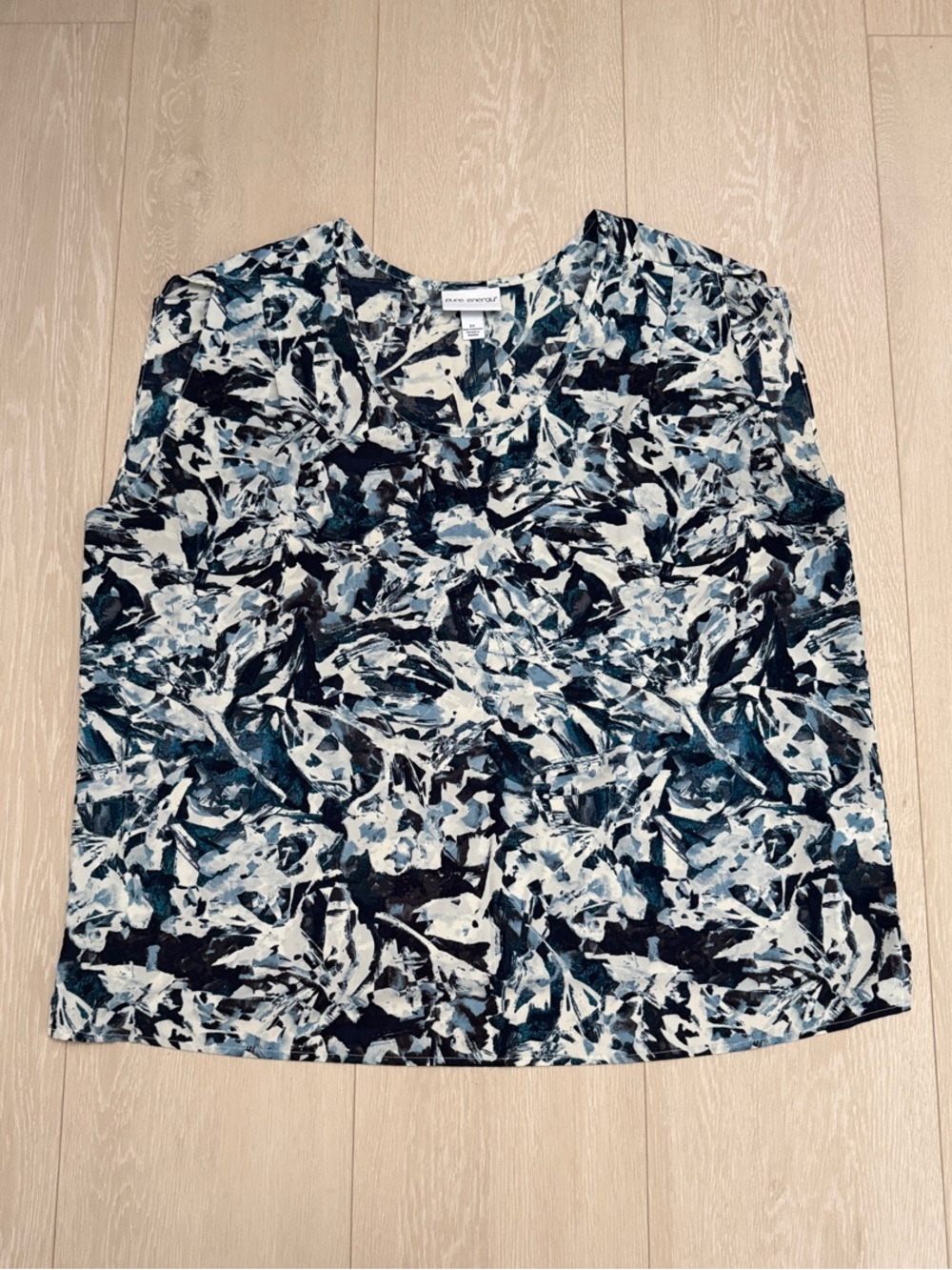 ✨ Pure Energy Blue and White Abstract V-Neck Sleeveless Blouse